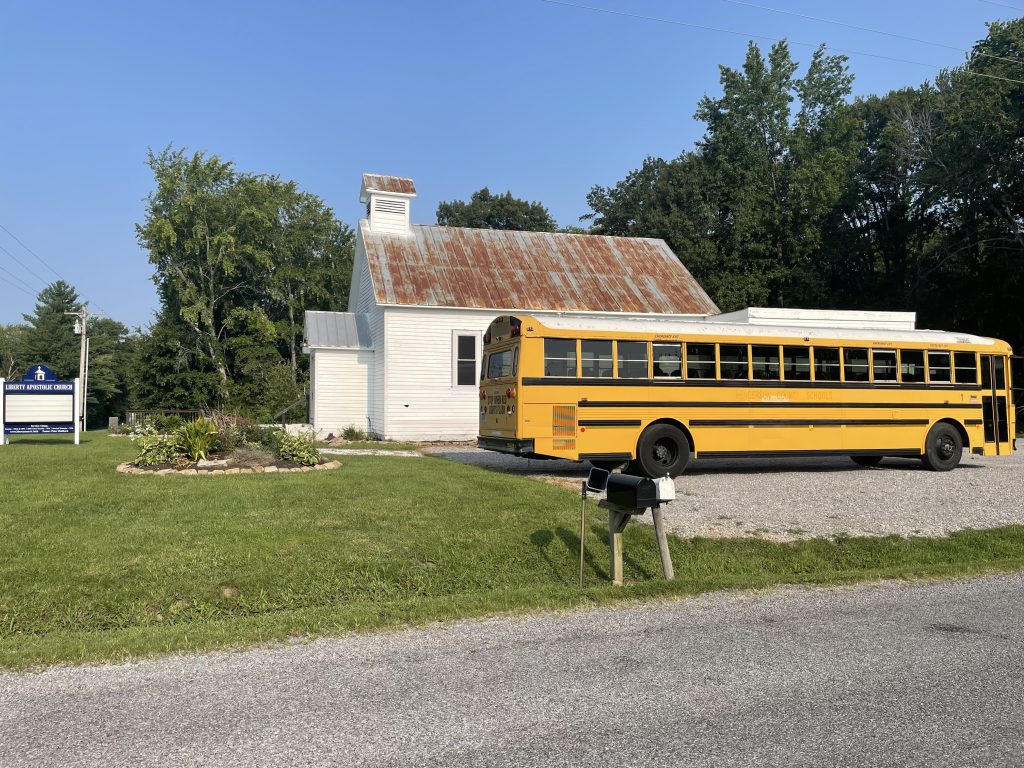 Bus sitting on Liberty Apostolic Church parking lot